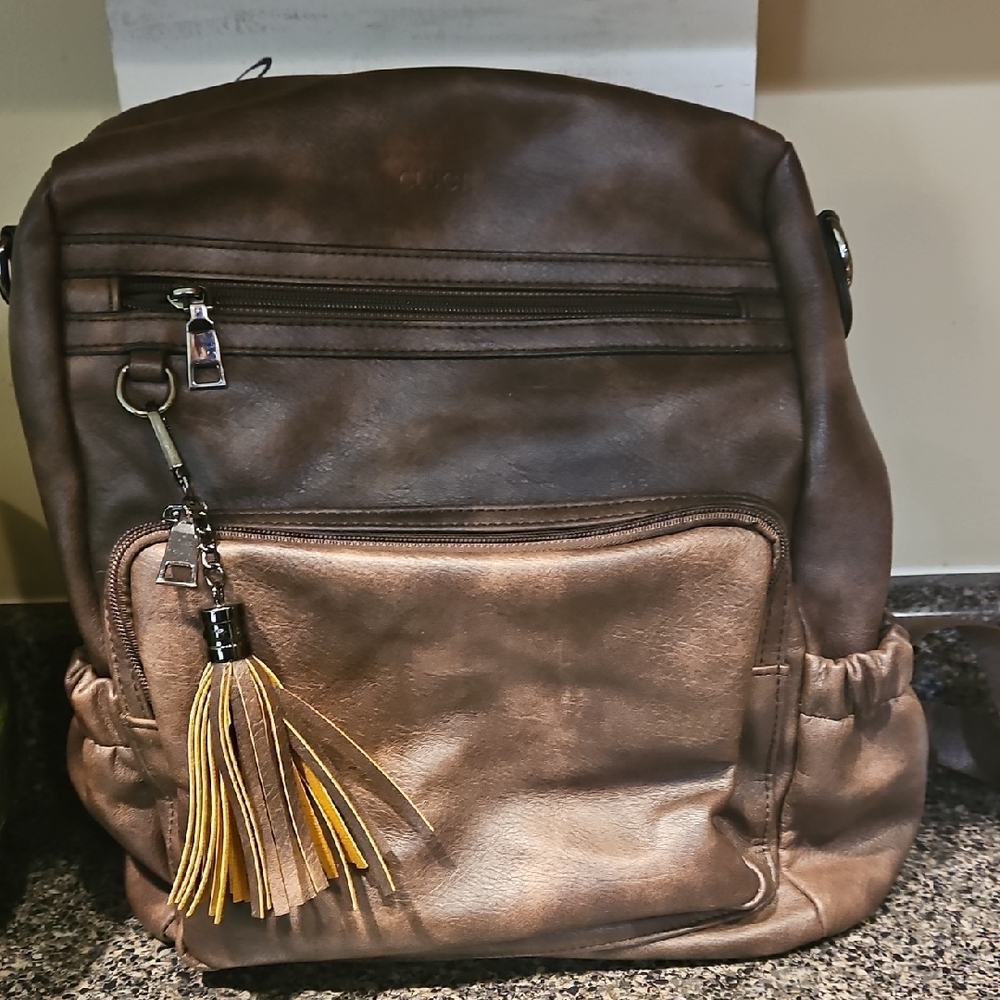 Brown Leather Backpack with Tassel